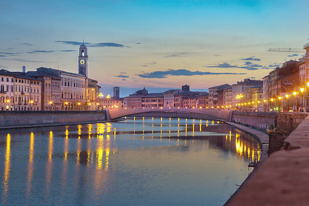 Summer 2013. The "Ponte di Mezzo" bridge is in the very centre of Pisa, Tuscany. Here it is photographed just after the sunset.