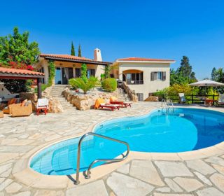 Private swimming pool and patio area outside Cyprus villa